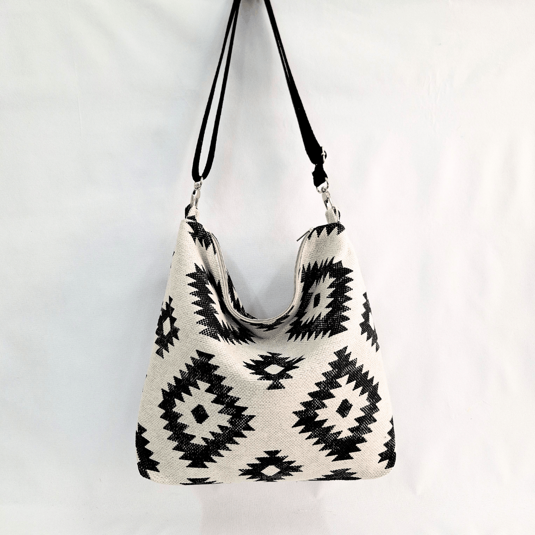 bolso de tela blanco y negro Eclipse Cristina Alba