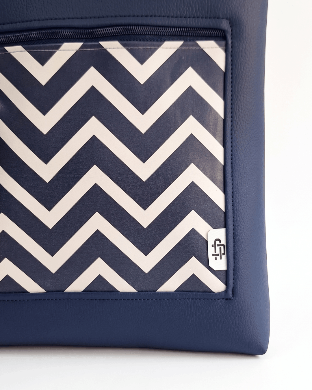 cristina-alba-mochila-mujer-antirrobo-reversible-138-crema-azul-marino
