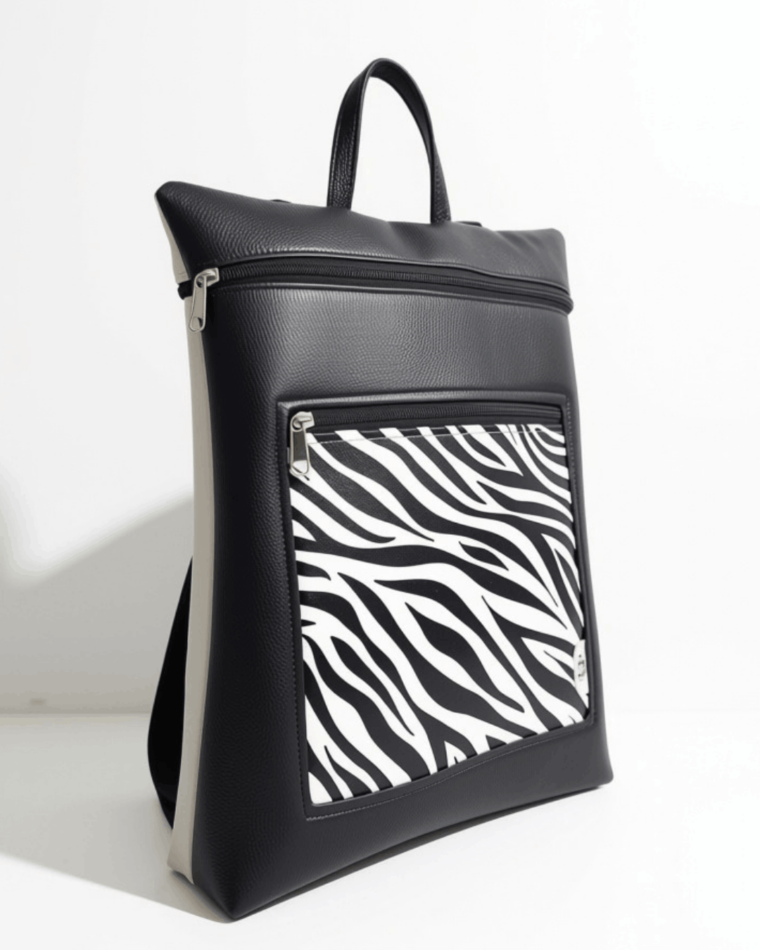 cristina-alba-mochila-mujer-antirrobo-reversible-17-animal-print-negro-gris