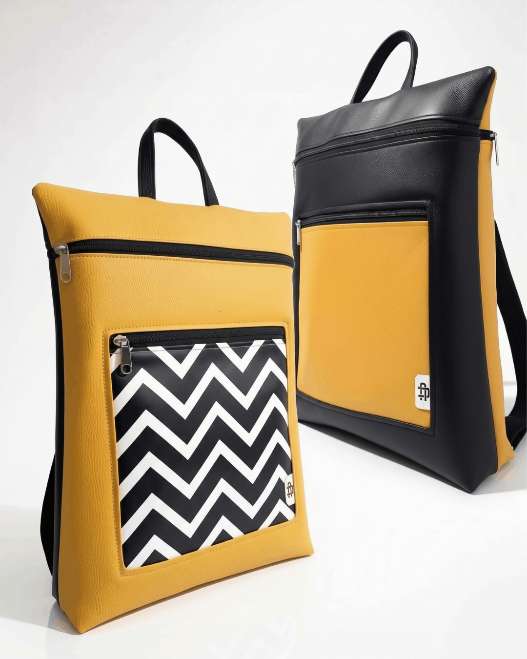 Mochila Antirrobo Reversible BRISA | Amarillo y Negro cristina-alba-mochila-mujer-antirrobo-reversible-24-amarillo-mostaza-negro