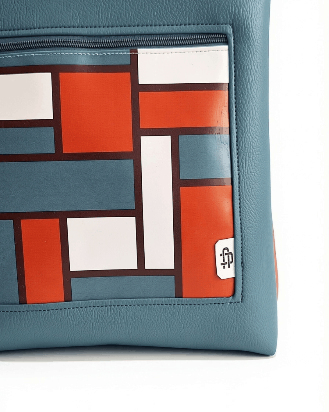 cristina-alba-mochila-mujer-antirrobo-reversible-77-terracota-teja-azul