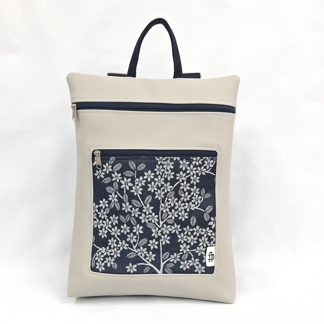 cristina-alba-mochila-reversible-antirrobo-impermeable-2026-03