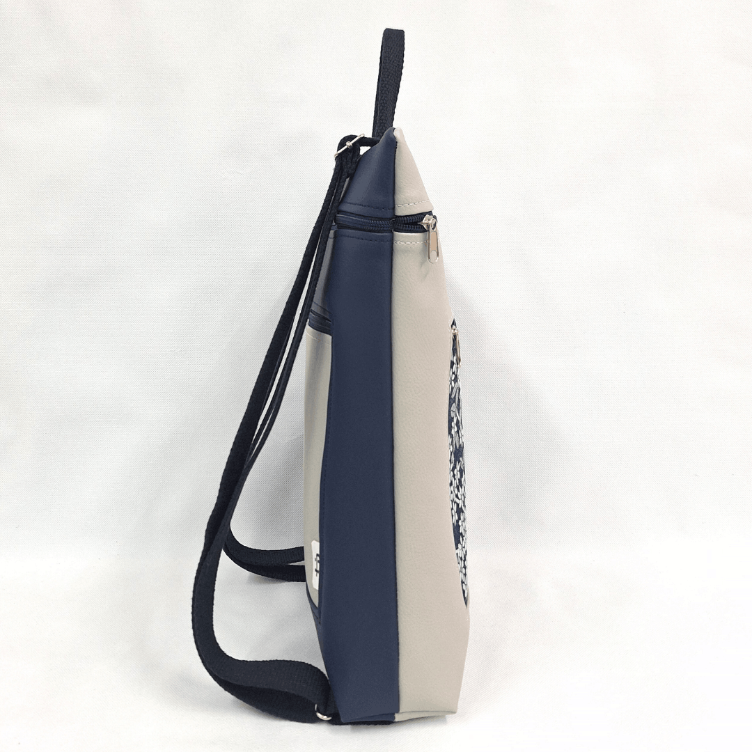 cristina-alba-mochila-reversible-antirrobo-impermeable-2026-04