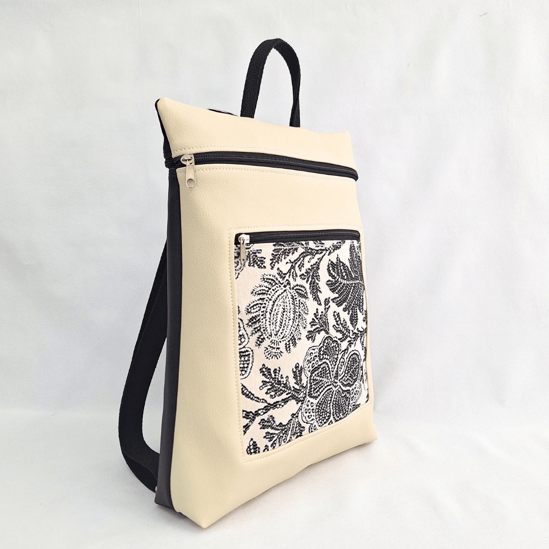 cristina-alba-mochila-reversible-antirrobo-impermeable-2026-112