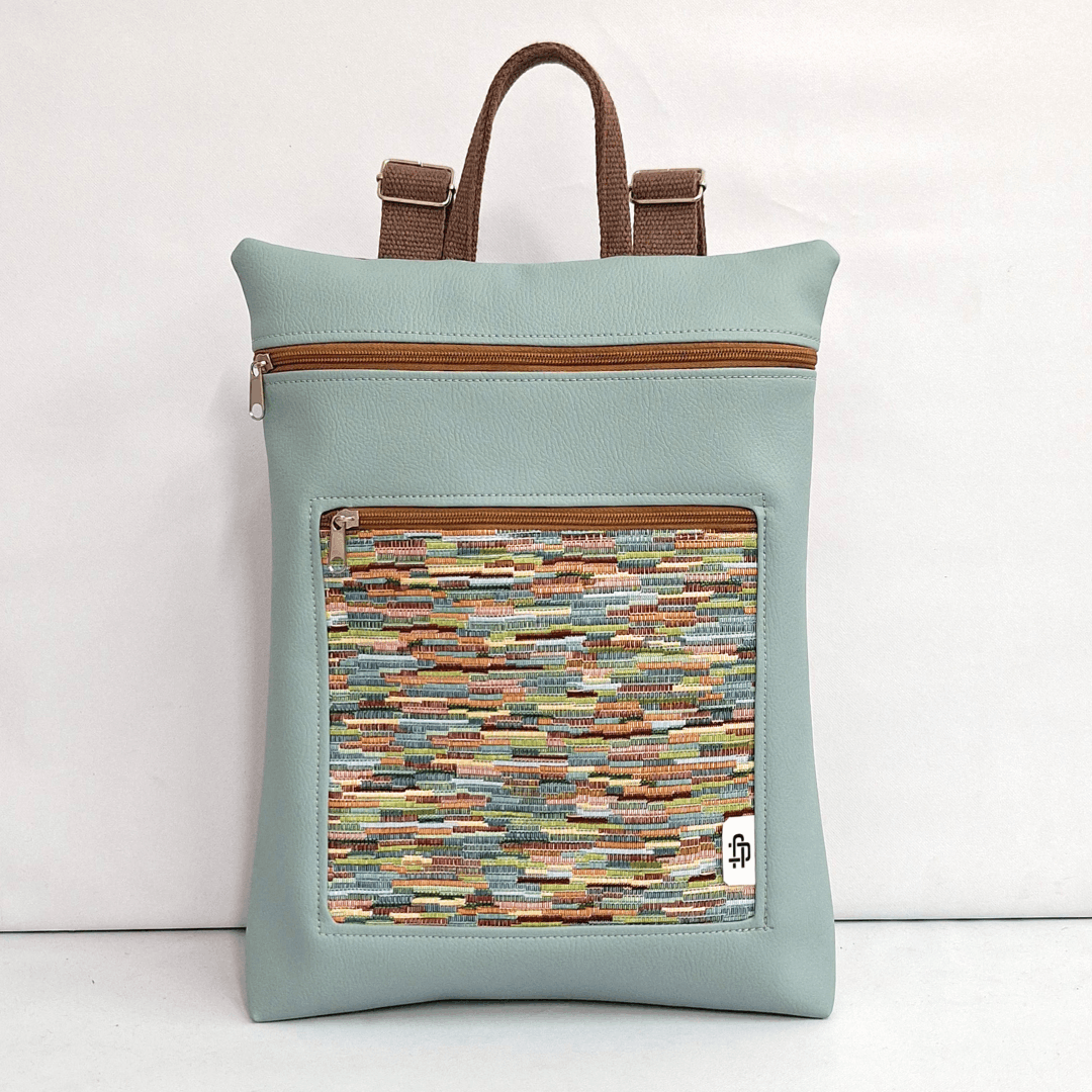 cristina-alba-mochila-reversible-antirrobo-impermeable-2026-135