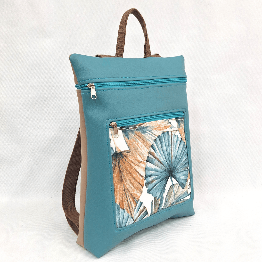 cristina-alba-mochila-reversible-antirrobo-impermeable-2026-34