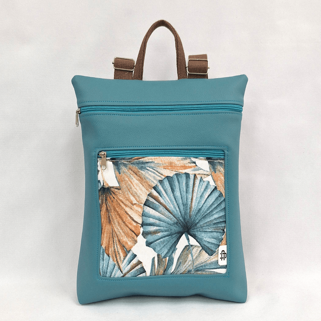 cristina-alba-mochila-reversible-antirrobo-impermeable-2026-35