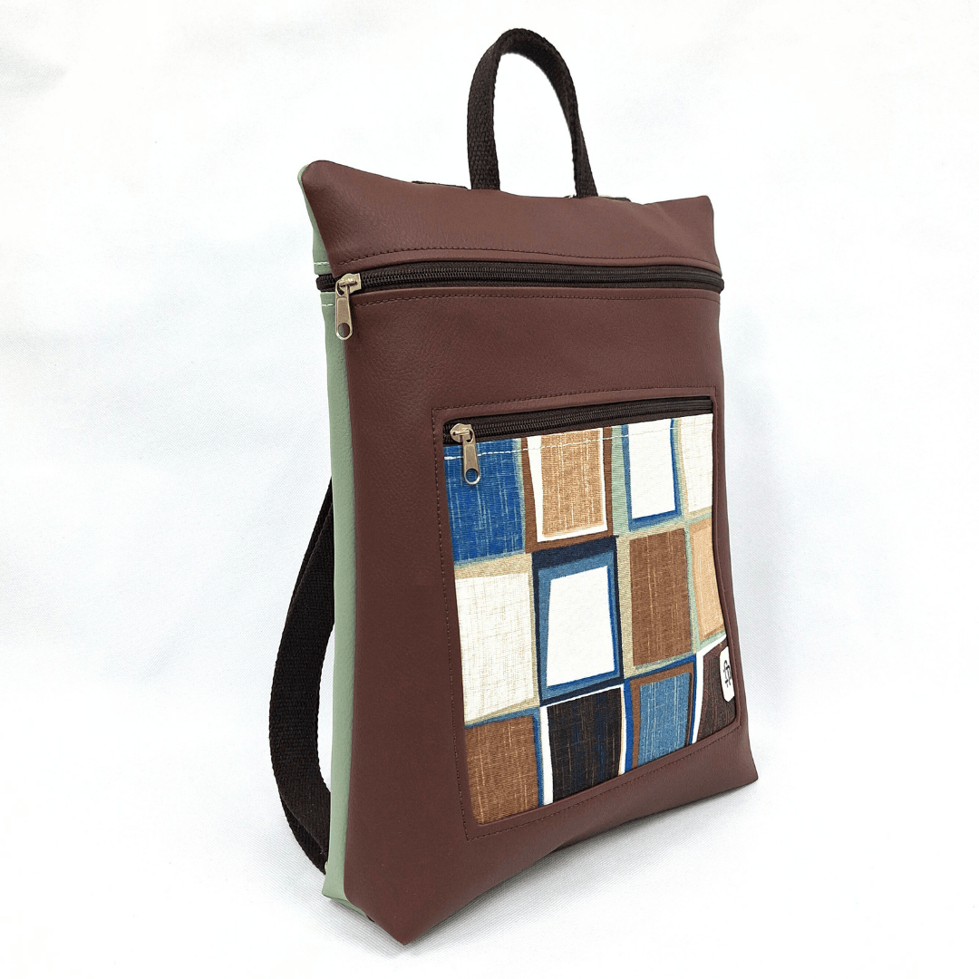 cristina-alba-mochila-reversible-antirrobo-impermeable-2026-58