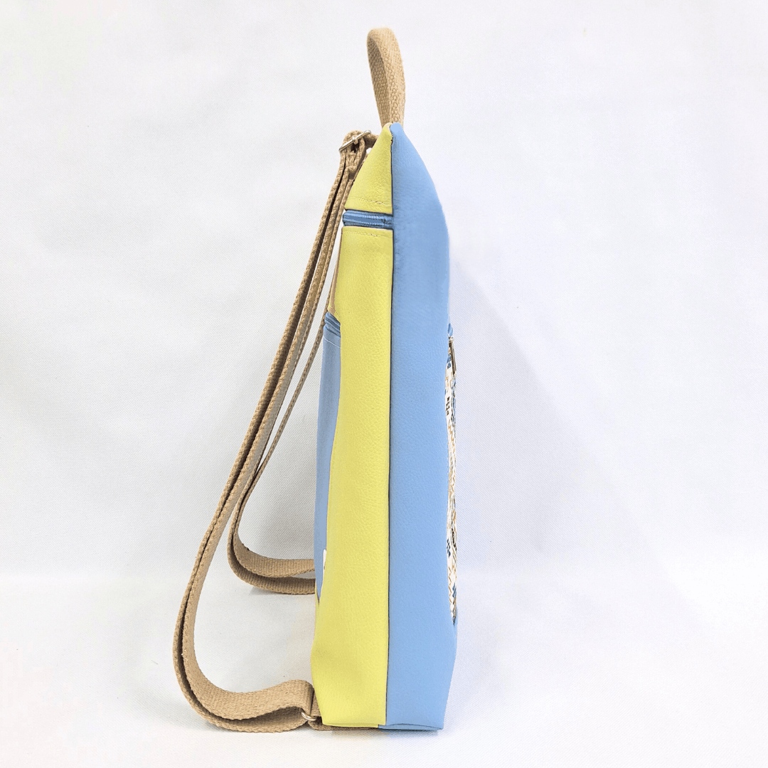 mochila-antirrobo-mujer-india-azul-celeste-amarillo-plana-cristina-alba