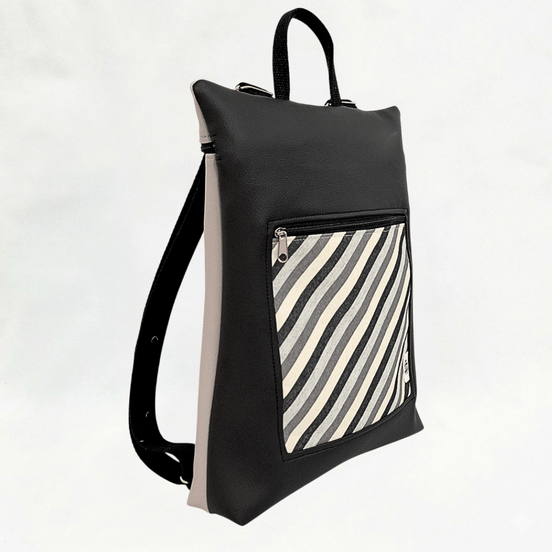 mochila-antirrobo-mujer-rayas-negro-gris-ceniza-portada-cristina-alba