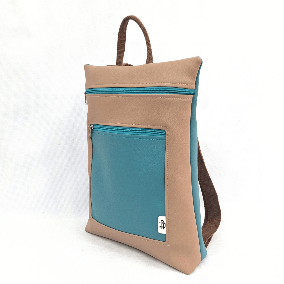 mochila-antirrobo-mujer-tropical-turquesa-nude-dos-colores-cristina-alba