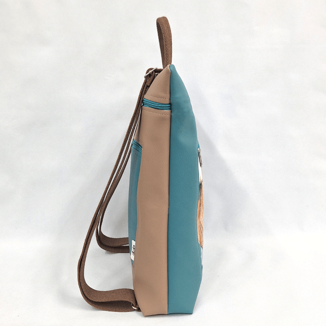 mochila-antirrobo-mujer-tropical-turquesa-nude-plana-cristina-alba