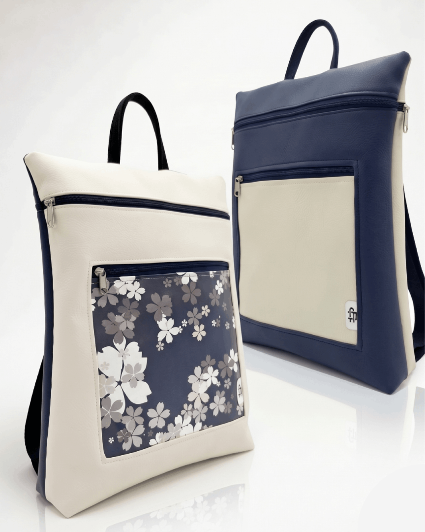 cristina-alba-mochila-mujer-antirrobo-reversible-125-crema-azul-marino
