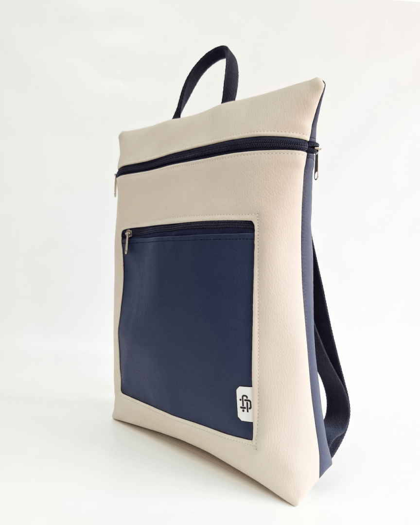 cristina-alba-mochila-mujer-antirrobo-reversible-136-crema-azul-marino