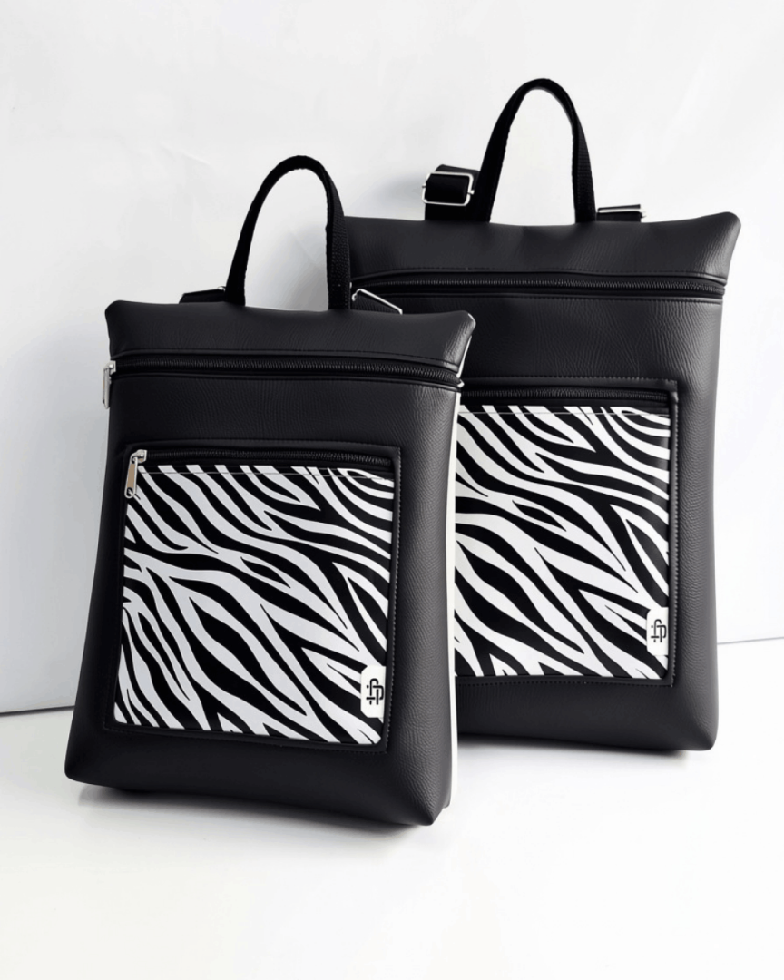 cristina-alba-mochila-mujer-antirrobo-reversible-23-animal-print-negro-gris