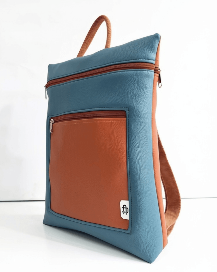 cristina-alba-mochila-mujer-antirrobo-reversible-67-terracota-teja-azul