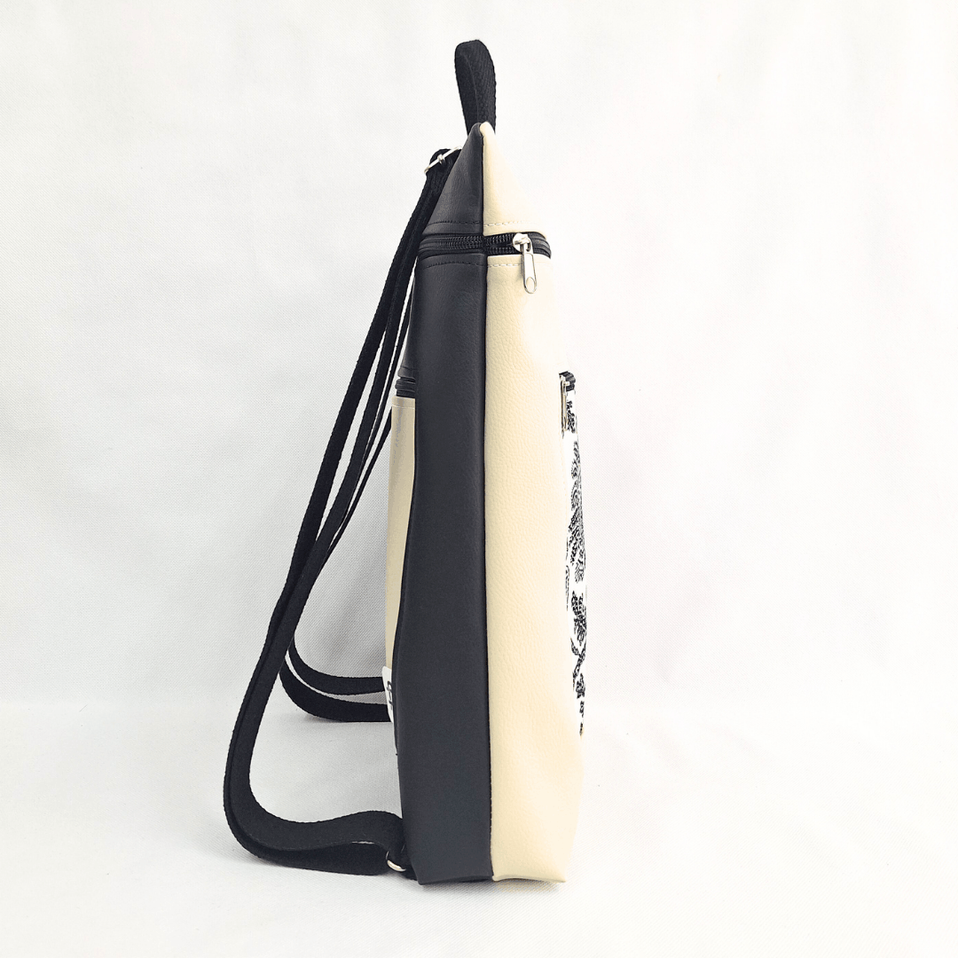 cristina-alba-mochila-reversible-antirrobo-impermeable-2026-114